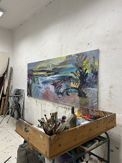 Art studio with colorful abstract painting